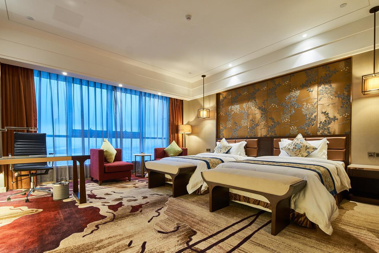 Zhongshan Guzhen Huayu Landmark Hotel Exterior photo