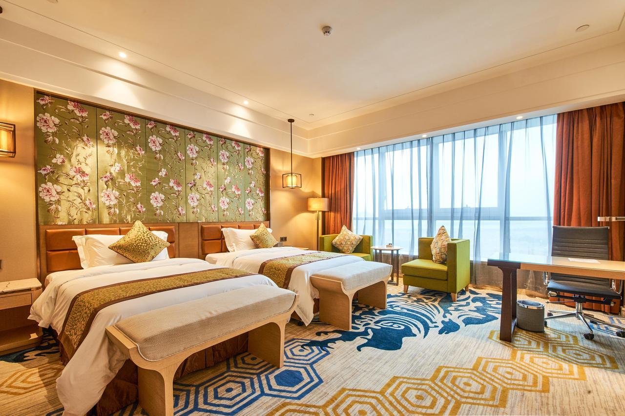 Zhongshan Guzhen Huayu Landmark Hotel Exterior photo